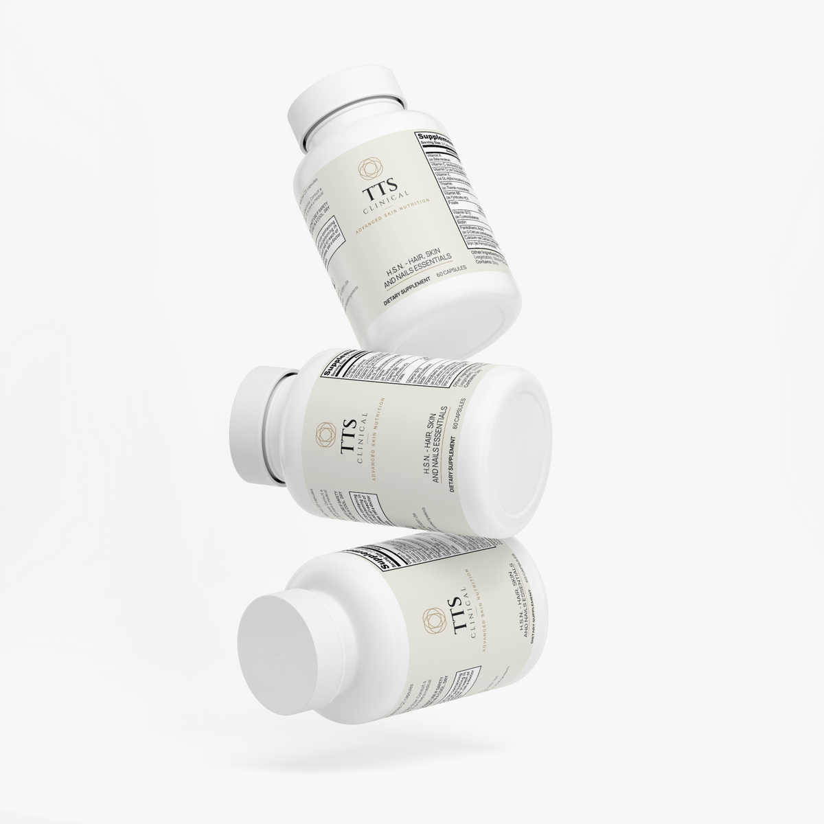 Three H.S.N. Hair, Skin and Nails bottles at an angle
