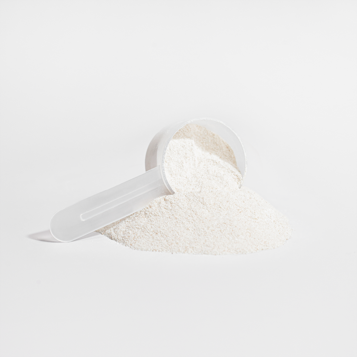Scoop with a mound of Grass-Fed Collagen Building Peptides powder