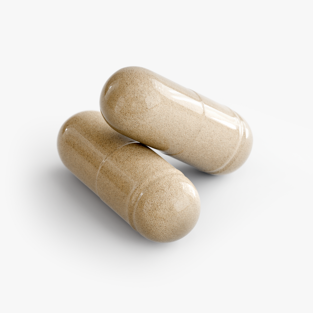 Close-up of two Beauty Sleep Formula capsules