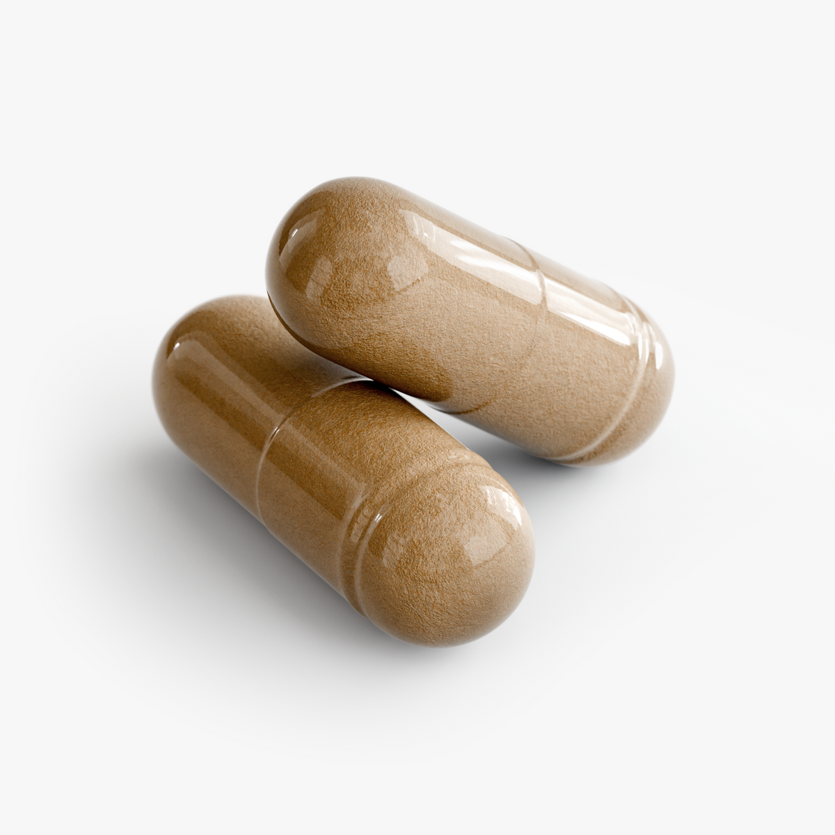 Close-up of two brown Clear Skin Detox capsules